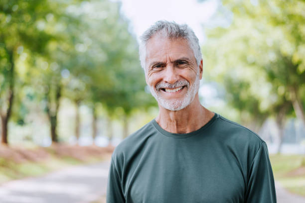 Relaxed man outdoors in golden-hour light