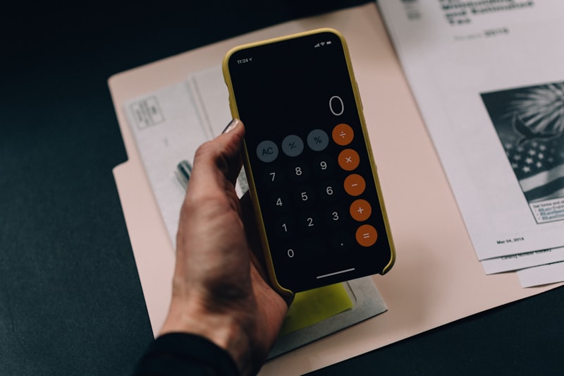 Homeowner on phone calculator